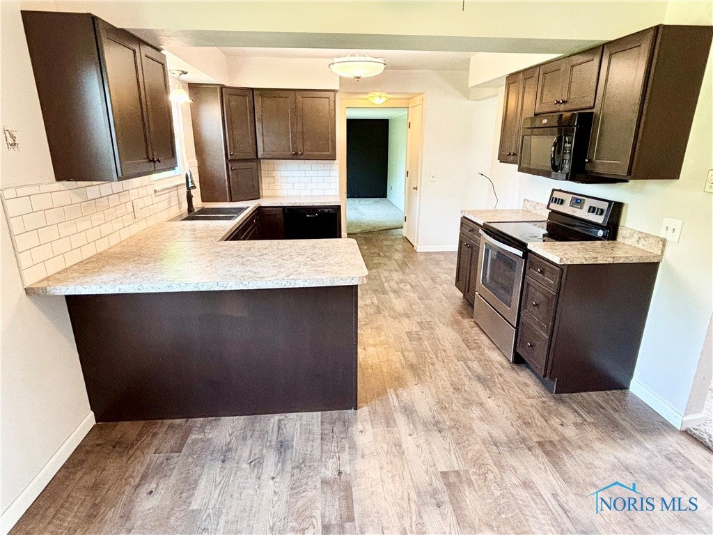 1105 South Lallendorf Road Oregon, OH 43616 - Photo 9 of 49 Newer kitchen.