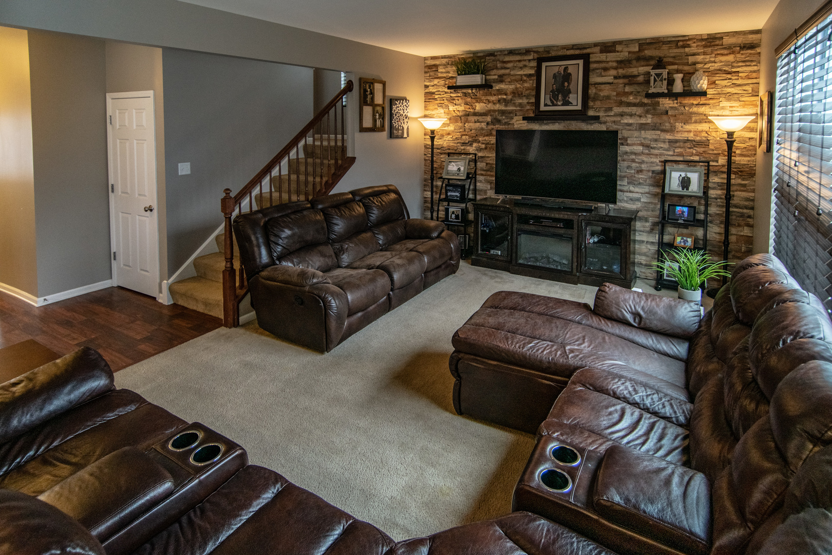 6500 Roth Drive Joliet, IL 60431 - Photo 21 of 36 a living room with furniture and a flat screen tv