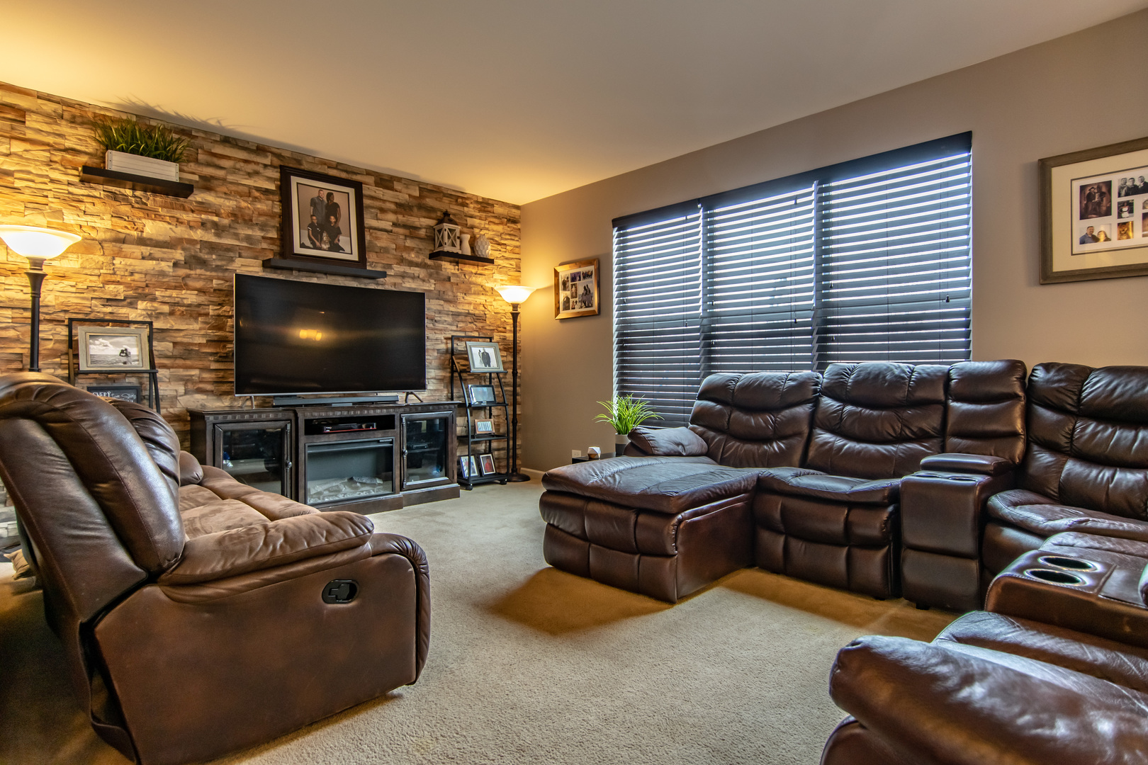 6500 Roth Drive Joliet, IL 60431 - Photo 22 of 36 a living room with furniture and a flat screen tv