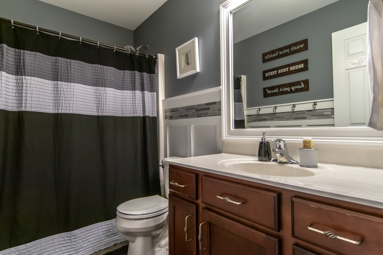 6500 Roth Drive Joliet, IL 60431 - Photo 33 of 36 a bathroom with a sink a toilet and shower