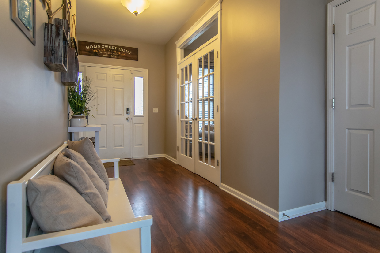 6500 Roth Drive Joliet, IL 60431 - Photo 7 of 36 a view of entryway with wooden floor