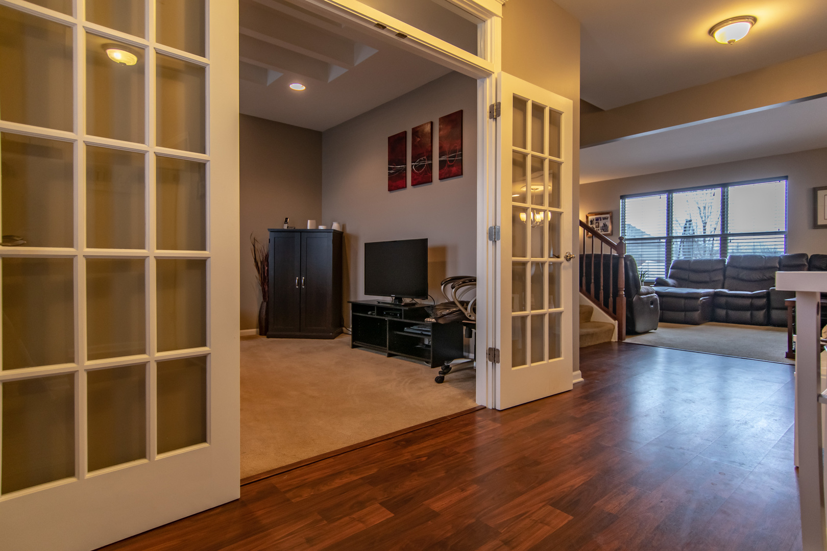 6500 Roth Drive Joliet, IL 60431 - Photo 8 of 36 a view of a livingroom with wooden floor and furniture