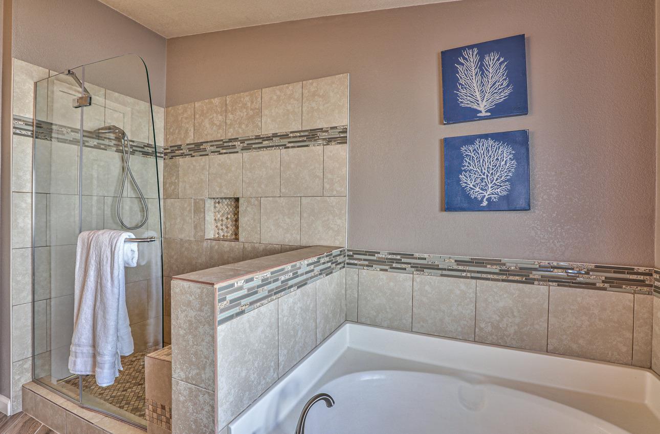 20 Russell Road, Unit 131 Salinas, CA 93906 - Photo 7 of 9 a bathroom with a bathtub and shower