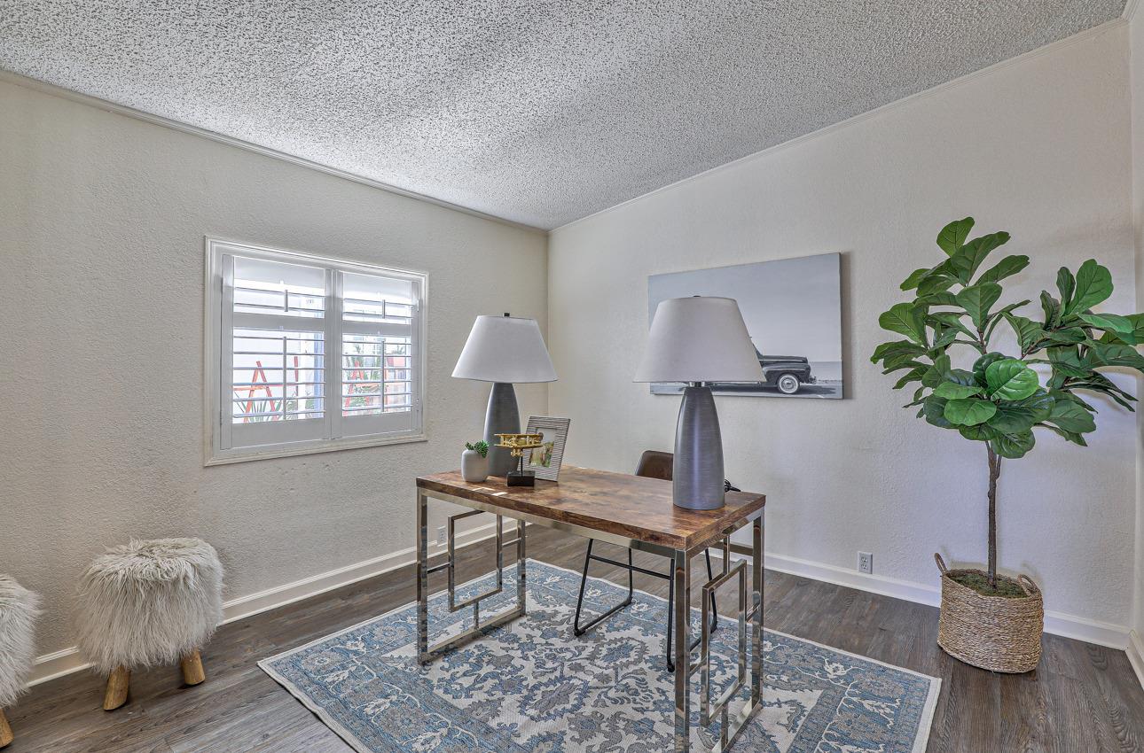 20 Russell Road, Unit 131 Salinas, CA 93906 - Photo 9 of 9 a living room with furniture and a potted plant