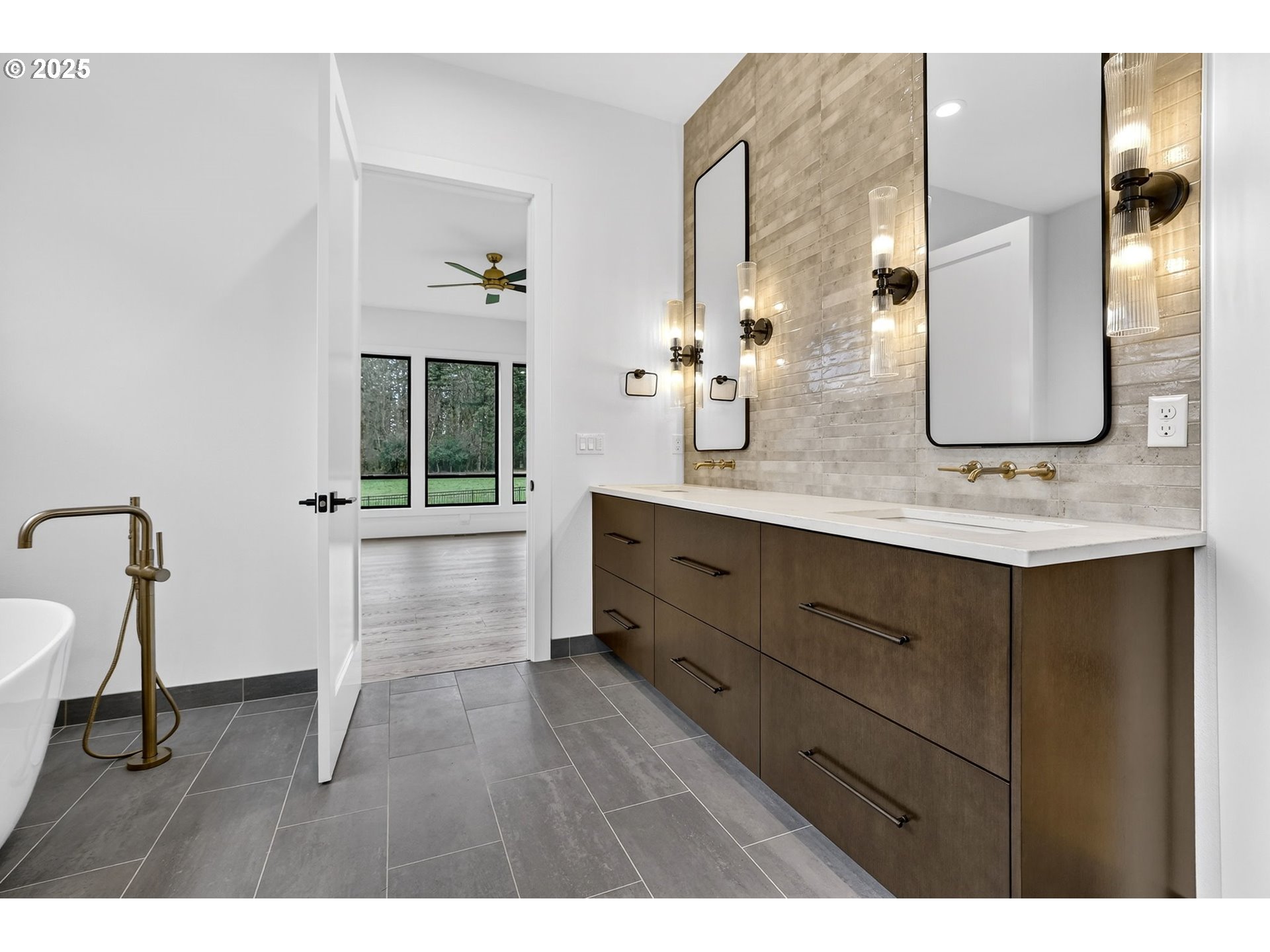 23322 Southeast Bohna Park Road Damascus, OR 97089 - Photo 24 of 40 a bathroom with a sink and a mirror