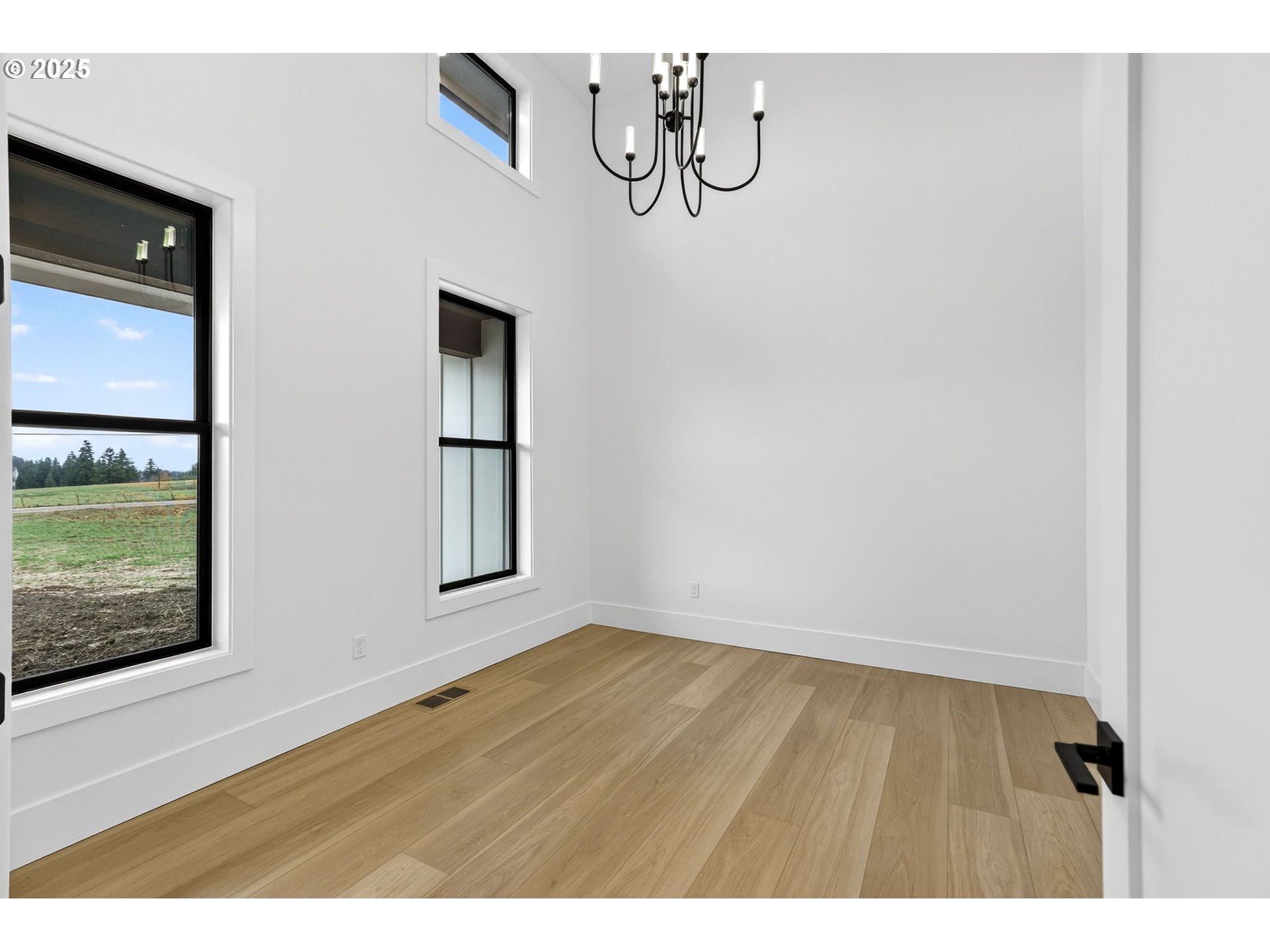 23322 Southeast Bohna Park Road Damascus, OR 97089 - Photo 30 of 40 a view of an entryway with wooden floor