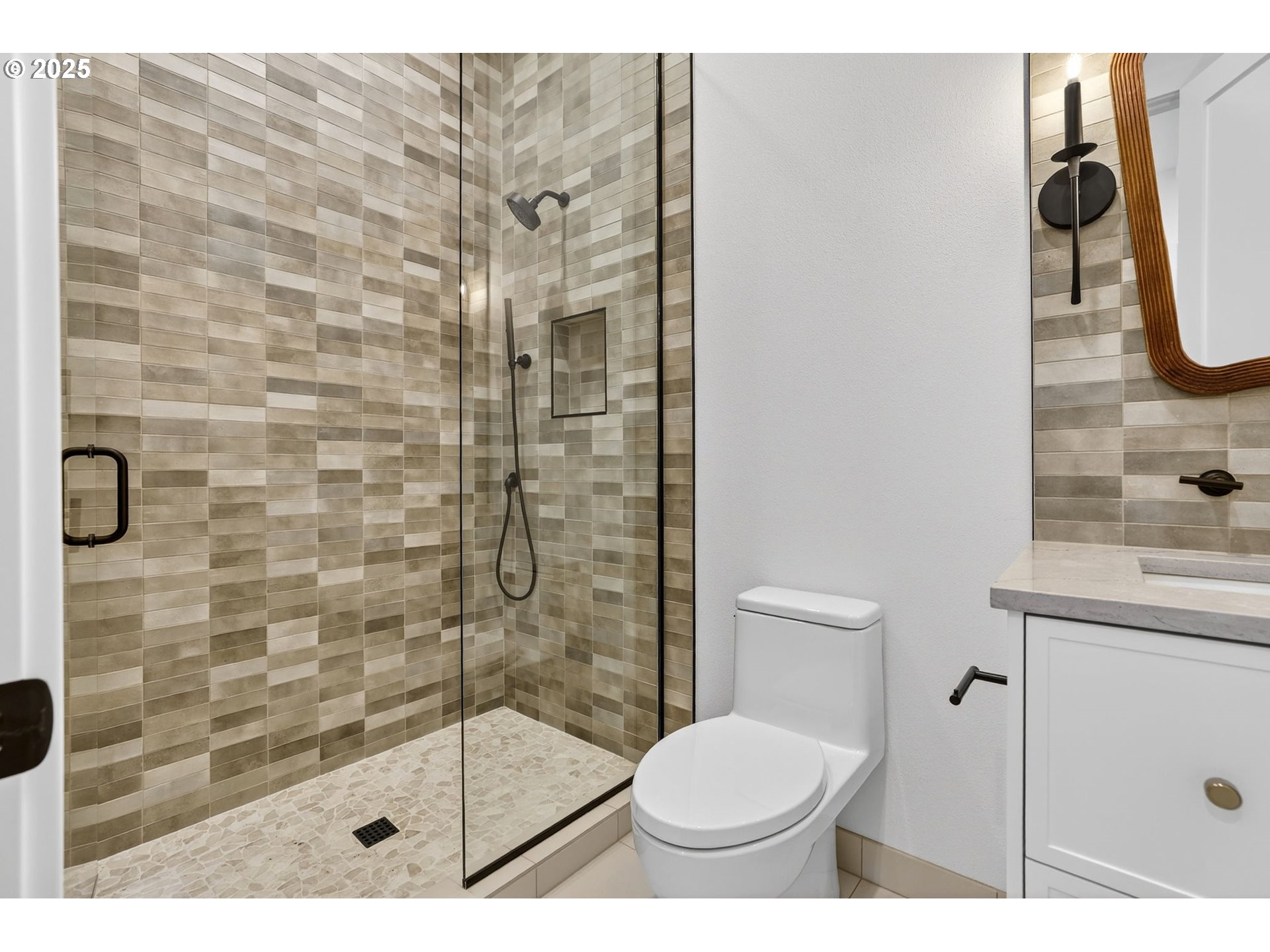 23322 Southeast Bohna Park Road Damascus, OR 97089 - Photo 33 of 40 a bathroom with a toilet and a shower