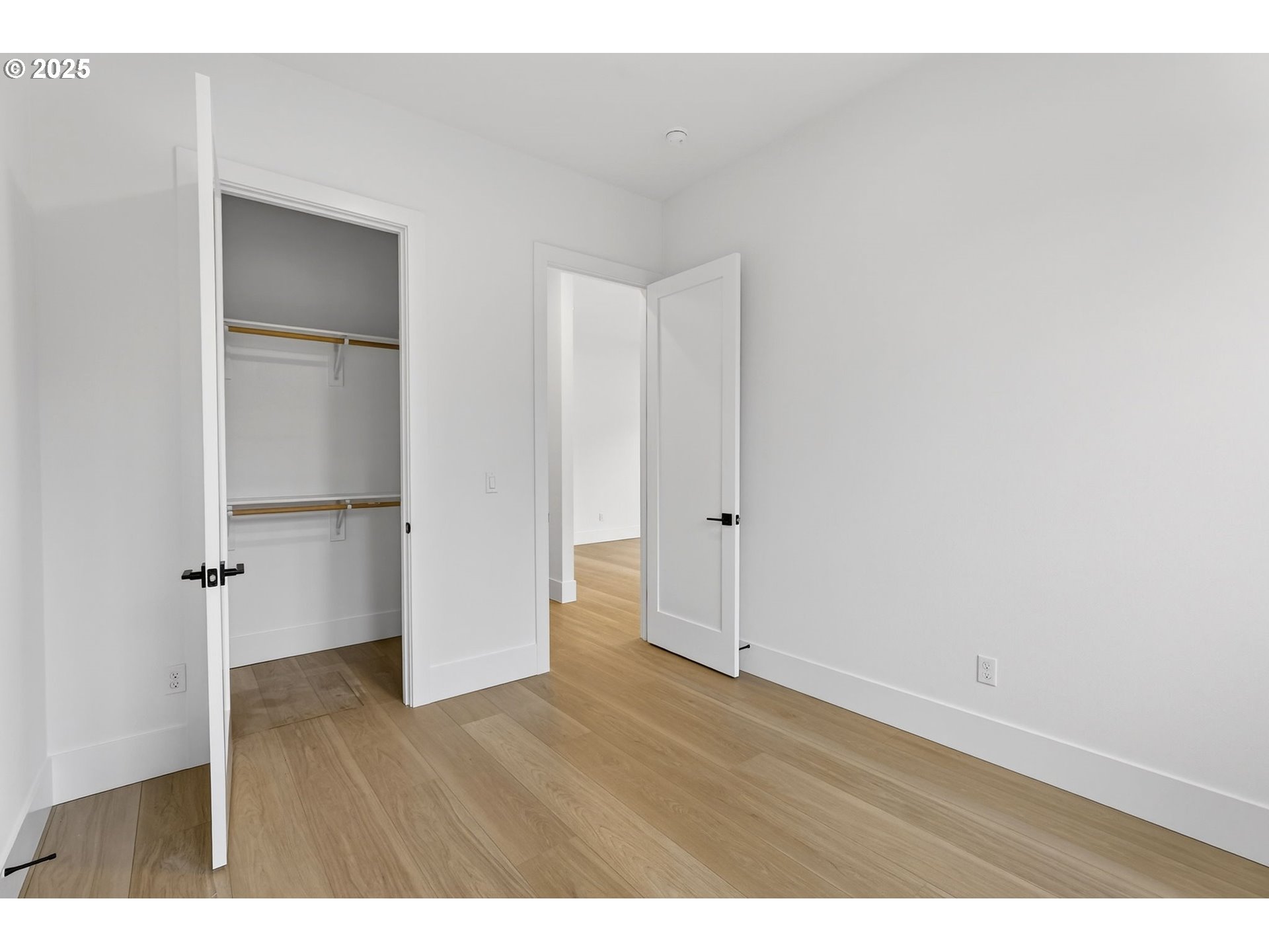 23322 Southeast Bohna Park Road Damascus, OR 97089 - Photo 36 of 40 a view of empty room with wooden floor