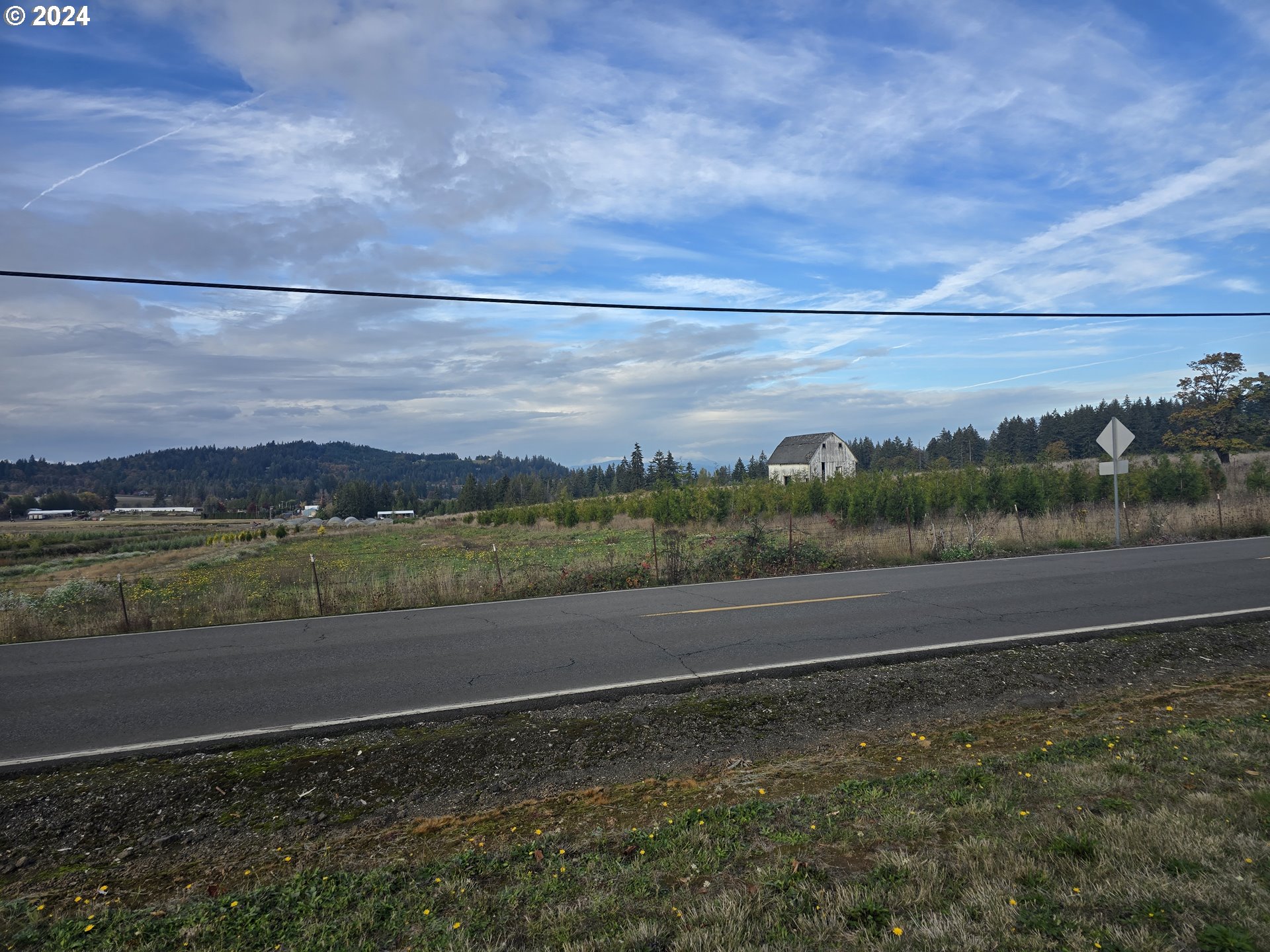 23322 Southeast Bohna Park Road Damascus, OR 97089 - Photo 4 of 40 a view of a yard with an outdoor space