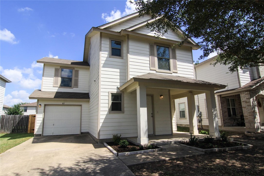 85 Jan Lane Georgetown, TX 78626 - Photo 1 of 1 a front view of a house with a garage
