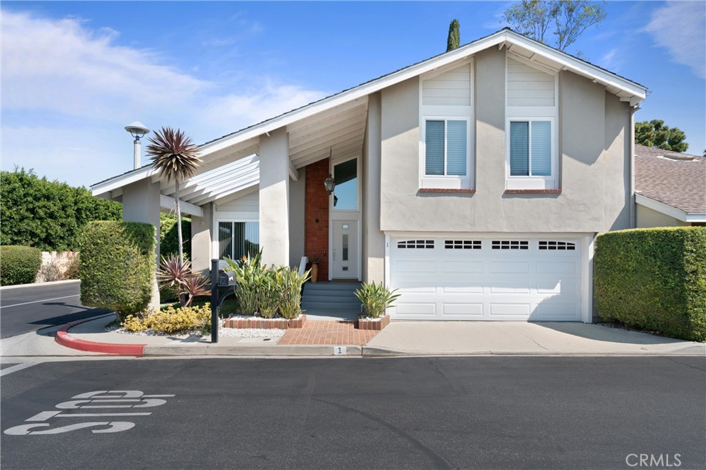 1 Tortoise Shell Irvine, CA 92604 - Photo 1 of 1 a front view of a house with a yard