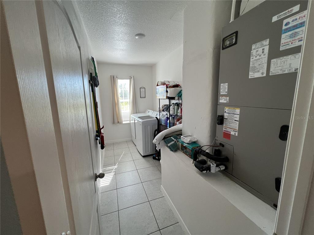 1106 Althea Drive Indian Lake Estates, FL 33843 - Photo 13 of 56 a view of a room with gym equipment