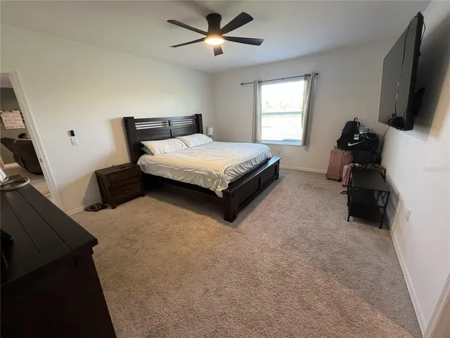 a room with furniture and a window