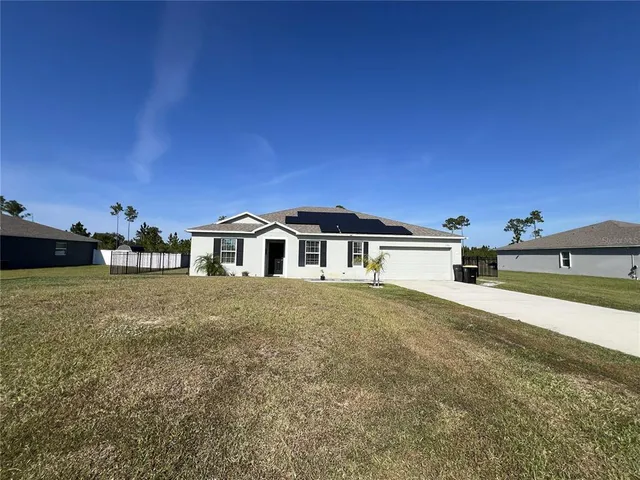 a view of house with outdoor space