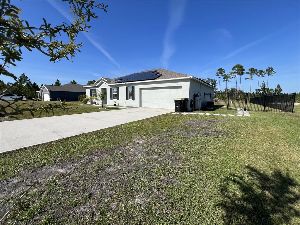 1106 Althea Drive Indian Lake Estates, FL 33843 - Photo 23 of 56 a view of house with outdoor space