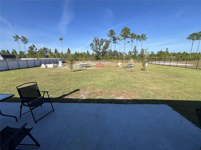 a view of wooden floor with a lake
