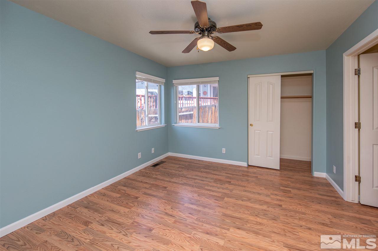 2259 Ridgeview Drive Reno, NV 89519 - Photo 20 of 39 wooden floor in an empty room with a window