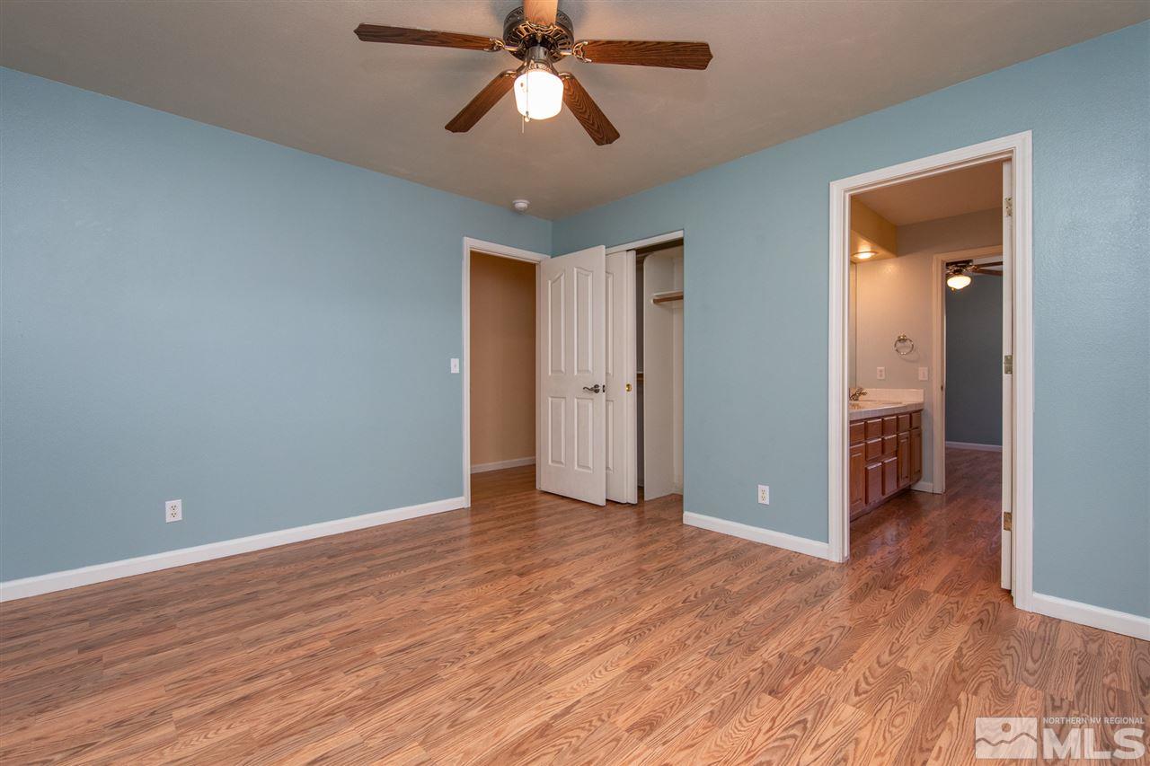 2259 Ridgeview Drive Reno, NV 89519 - Photo 22 of 39 a view of an empty room and wooden floor