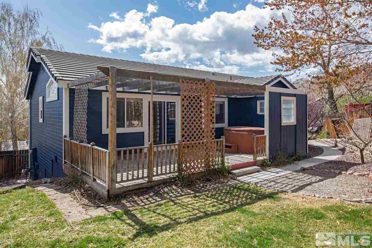 2259 Ridgeview Drive Reno, NV 89519 - Photo 29 of 39 a view of a house with a wooden deck front of house