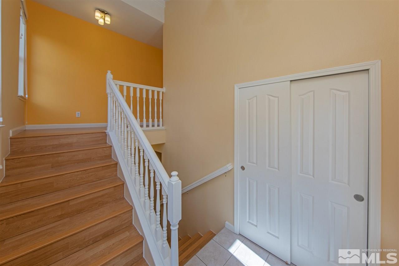 2259 Ridgeview Drive Reno, NV 89519 - Photo 4 of 39 a view of staircase with wooden floor and white walls