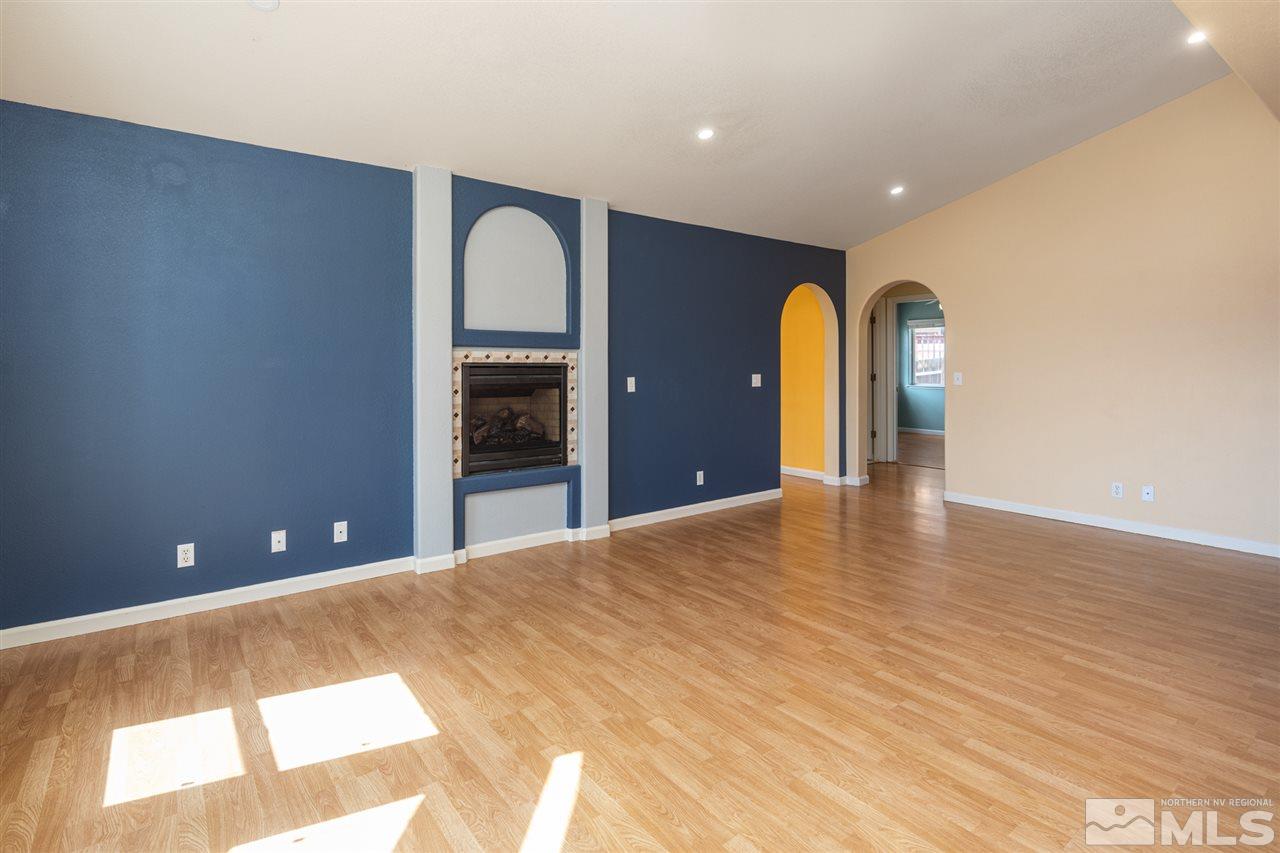 2259 Ridgeview Drive Reno, NV 89519 - Photo 8 of 39 a view of empty room with wooden floor