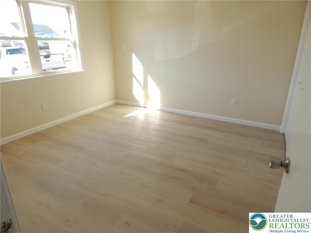 4117 Grape Street Coplay, PA 18037 - Photo 9 of 41 an empty room with windows