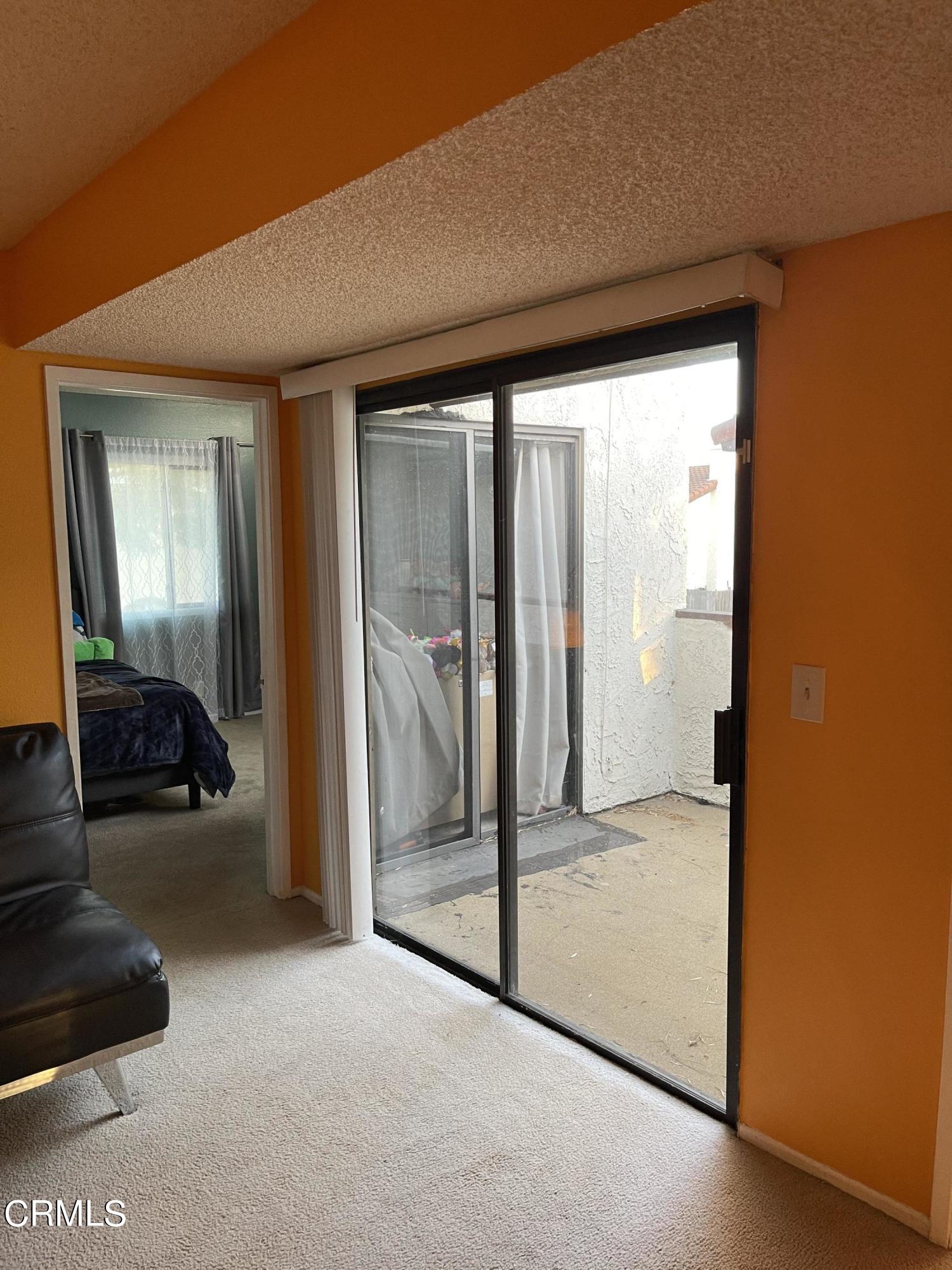 264 East Bard Road Oxnard, CA 93033 - Photo 8 of 17 a view of a big room with wooden floor and windows