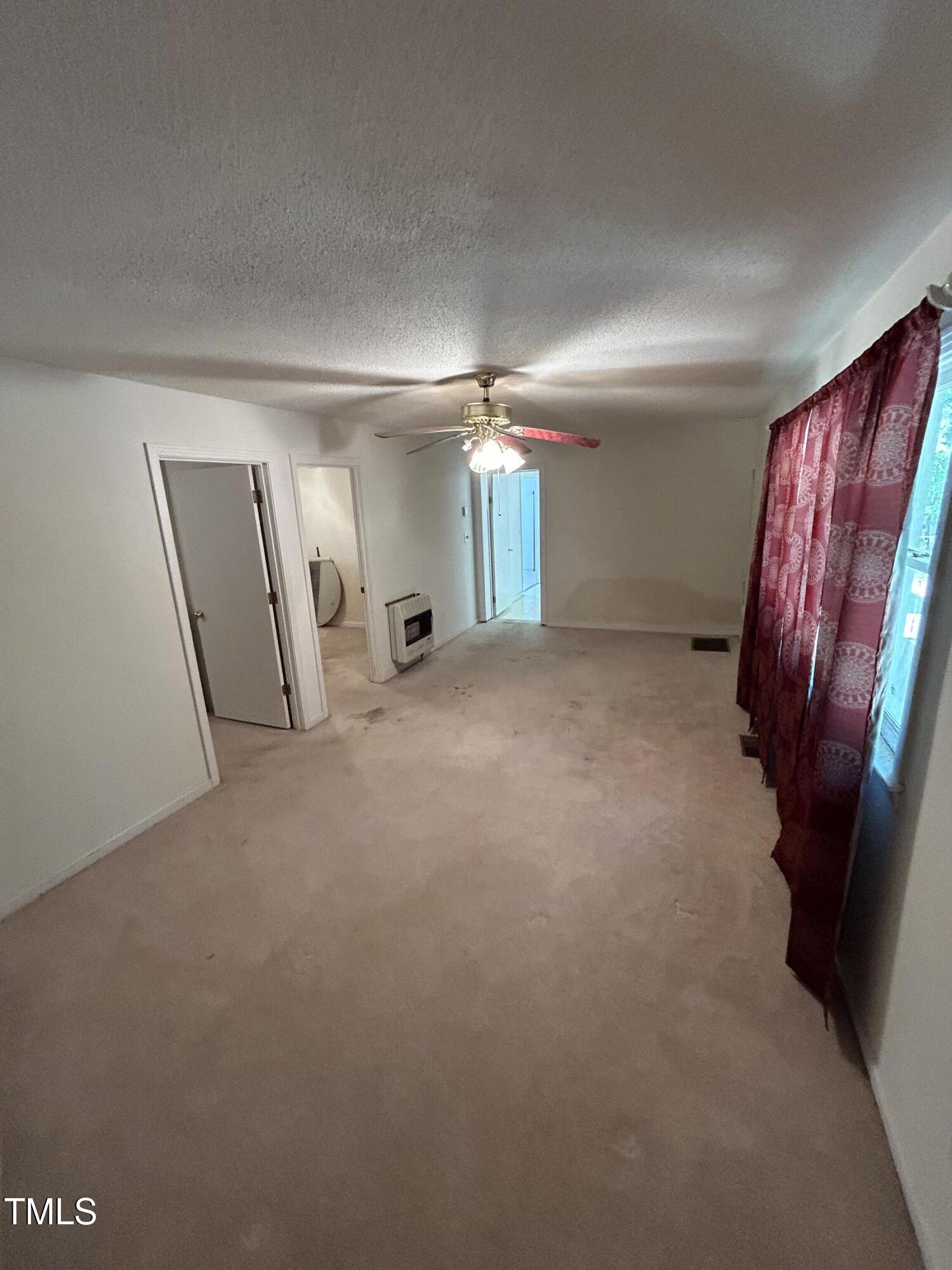683 Osgood Road Sanford, NC 27330 - Photo 13 of 13 a view of a livingroom with a staircase