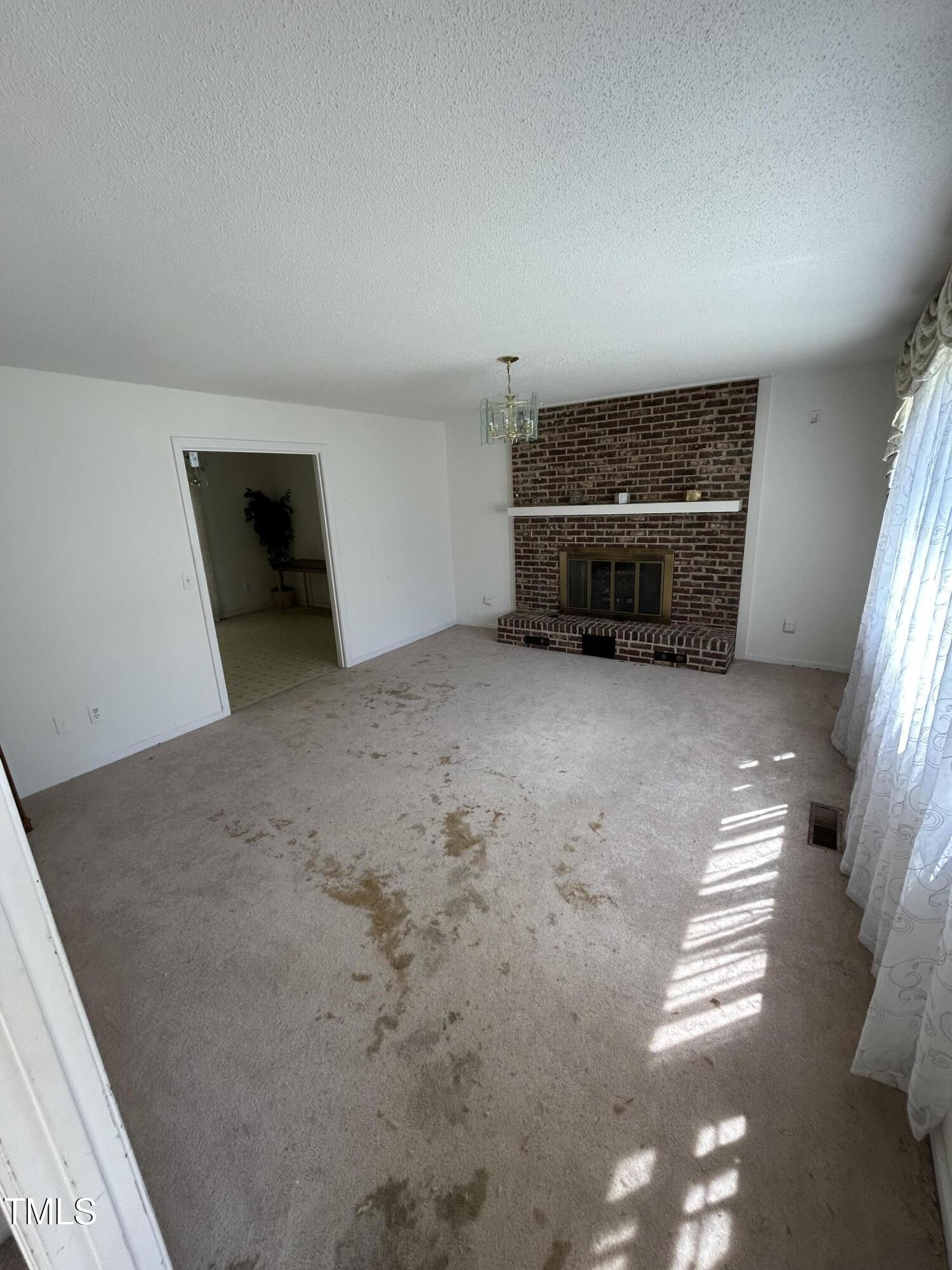 683 Osgood Road Sanford, NC 27330 - Photo 3 of 13 a view of a livingroom with furniture