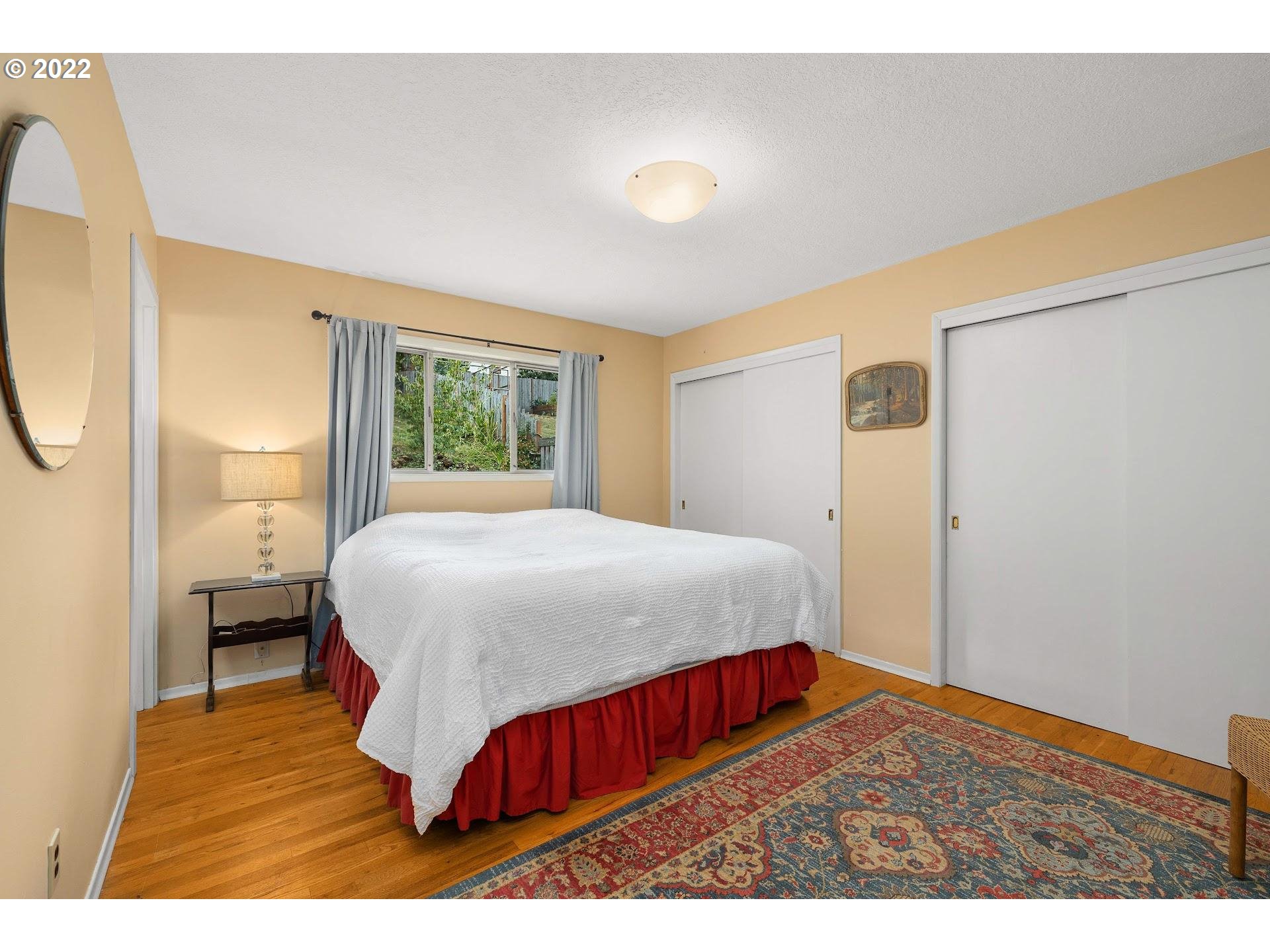 3302 Southwest Marigold Street Portland, OR 97219 - Photo 16 of 32 Primary Bedroom