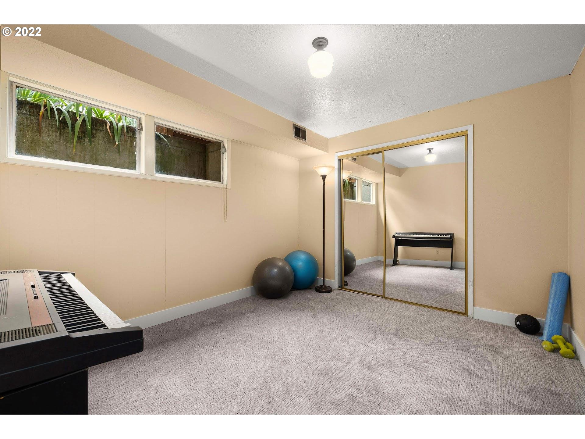 3302 Southwest Marigold Street Portland, OR 97219 - Photo 29 of 32 Bedroom