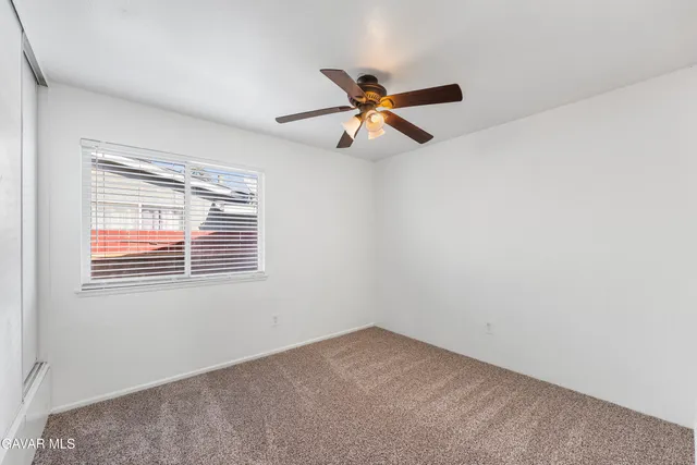 a view of a room with a window