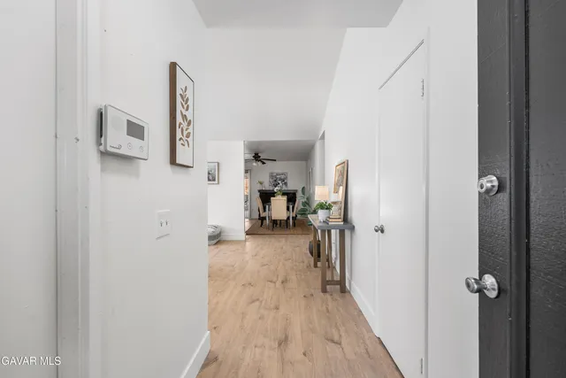 a view of a livingroom with wooden floor