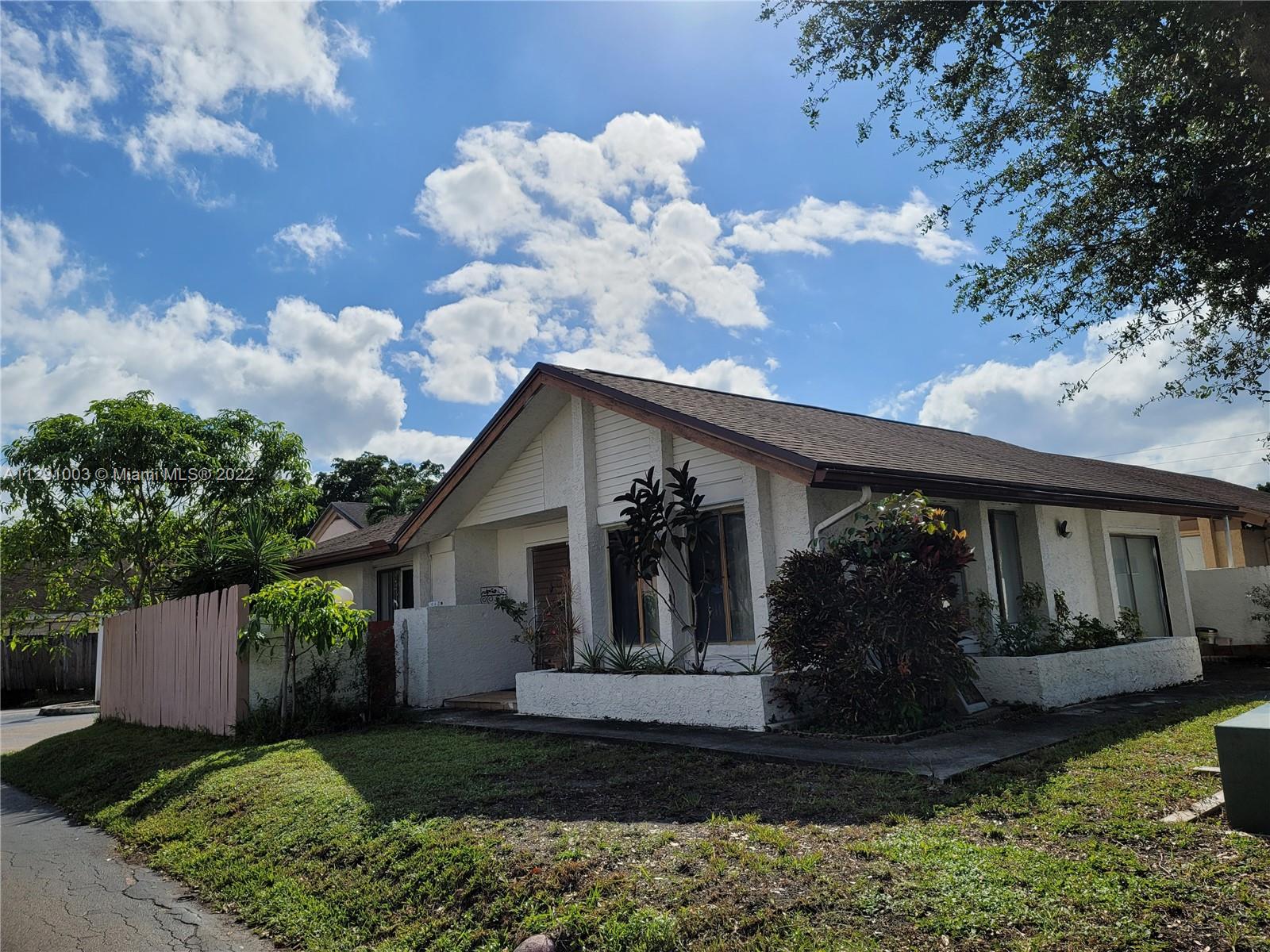 3931 Southwest 84th Terrace Davie, FL 33328 - Photo 3 of 15 a view of a house with backyard and garden