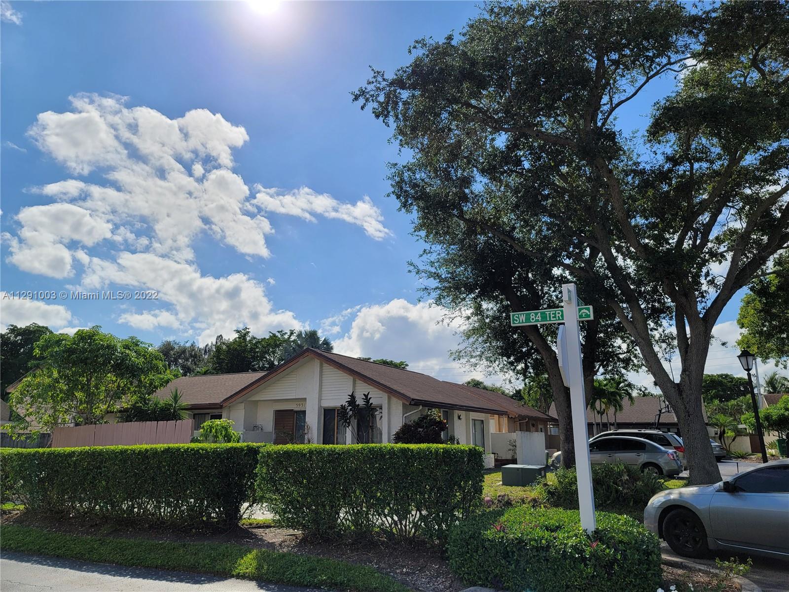 3931 Southwest 84th Terrace Davie, FL 33328 - Photo 6 of 15 a front view of a house with garden