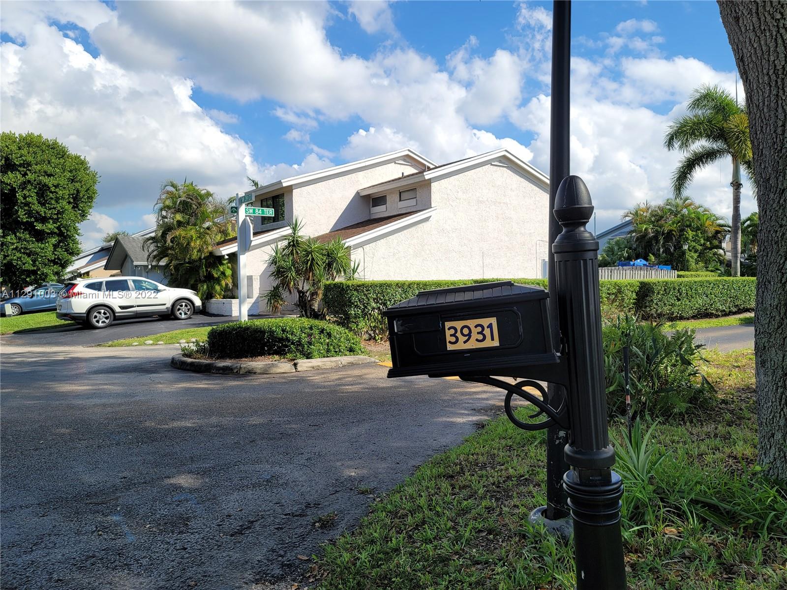 3931 Southwest 84th Terrace Davie, FL 33328 - Photo 7 of 15 a view of street with parked cars