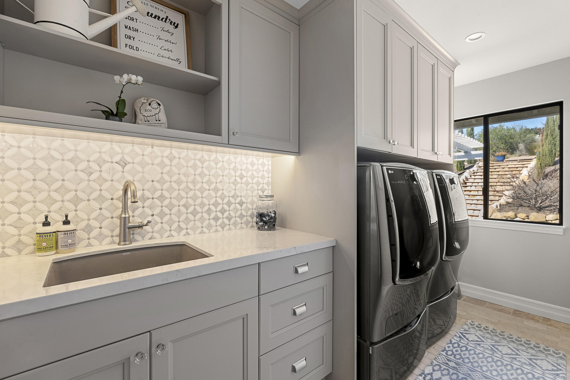 1855 Ringsted Drive Solvang, CA 93463 - Photo 12 of 30 a bathroom with a sink a mirror and shower