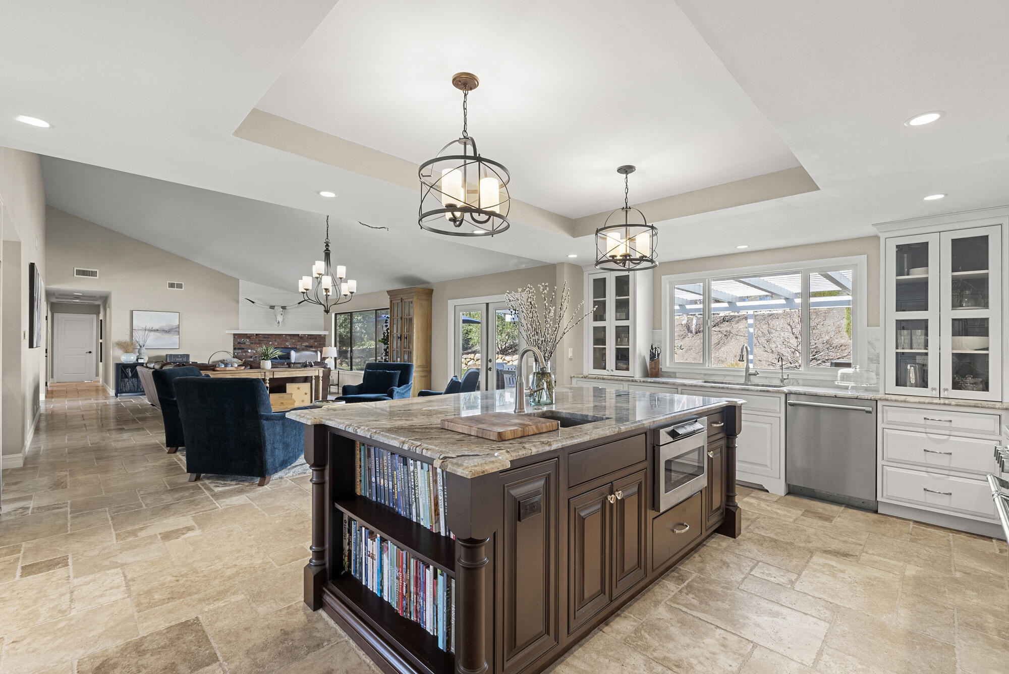 1855 Ringsted Drive Solvang, CA 93463 - Photo 13 of 30 a kitchen with kitchen island granite countertop a stove oven and cabinets