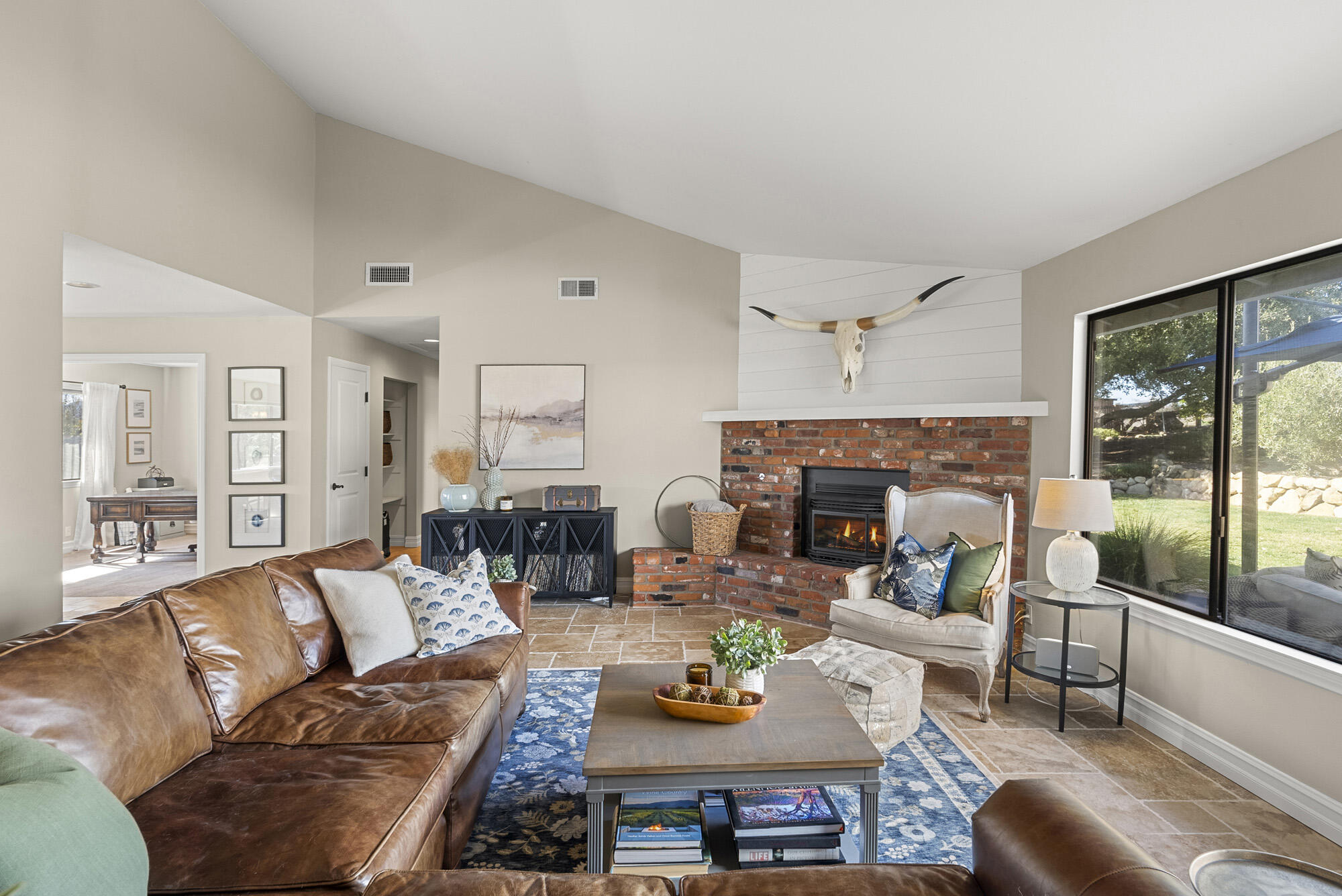 1855 Ringsted Drive Solvang, CA 93463 - Photo 15 of 30 a living room with furniture fireplace and a large window