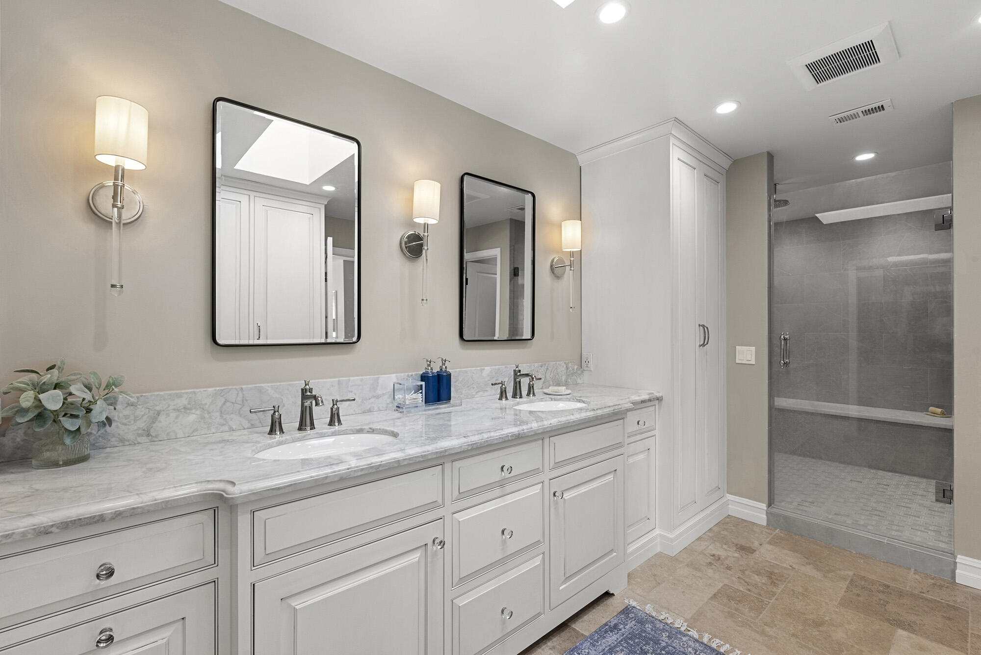 1855 Ringsted Drive Solvang, CA 93463 - Photo 19 of 30 a bathroom with double vanity sinks and a mirror