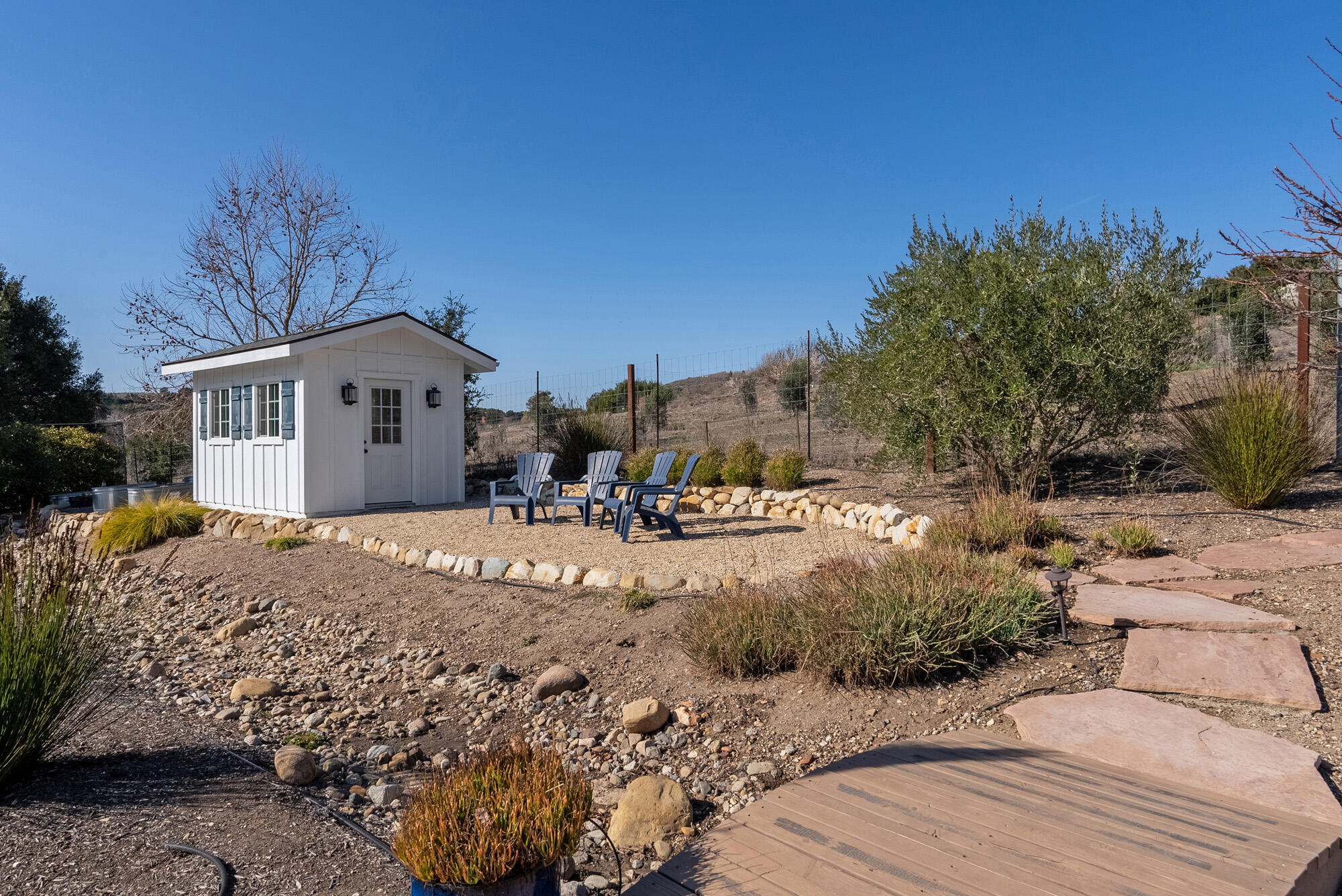 1855 Ringsted Drive Solvang, CA 93463 - Photo 27 of 30 a view of a house with a yard covered with snow in the background