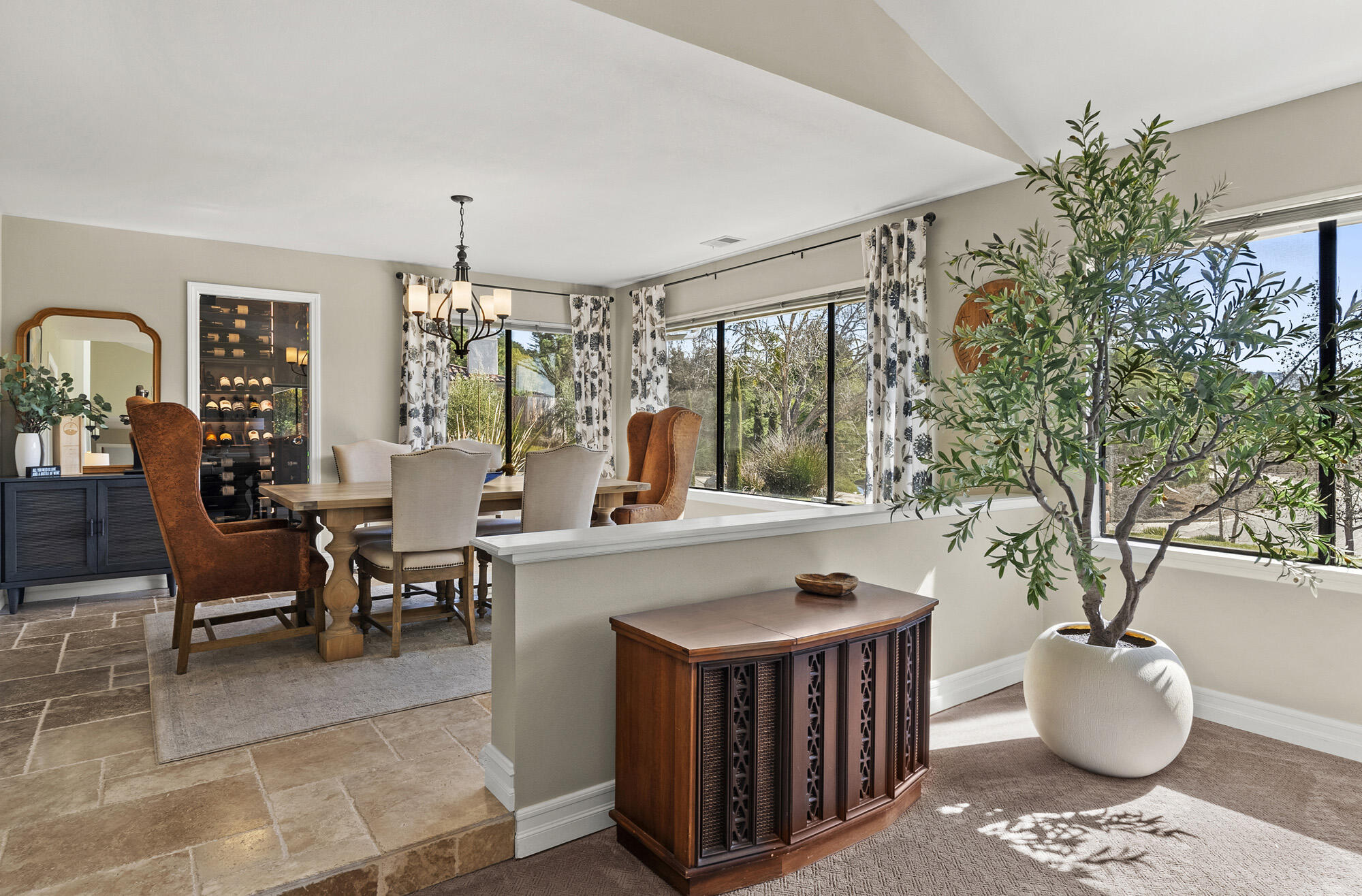 1855 Ringsted Drive Solvang, CA 93463 - Photo 3 of 30 a living room with furniture a chandelier and a potted plant