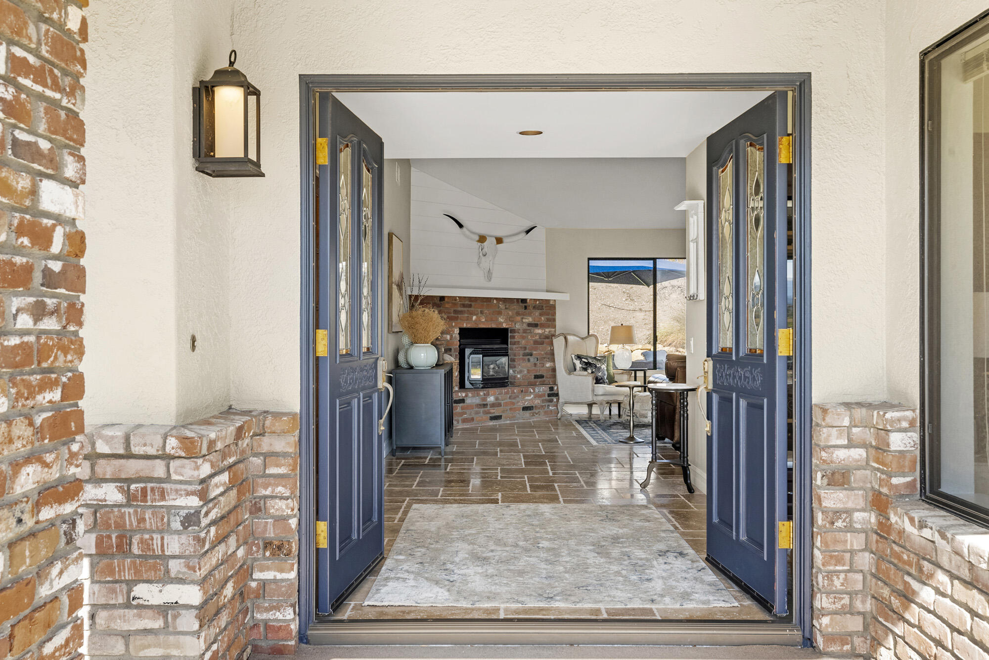 1855 Ringsted Drive Solvang, CA 93463 - Photo 5 of 30 a living room with furniture and a fireplace