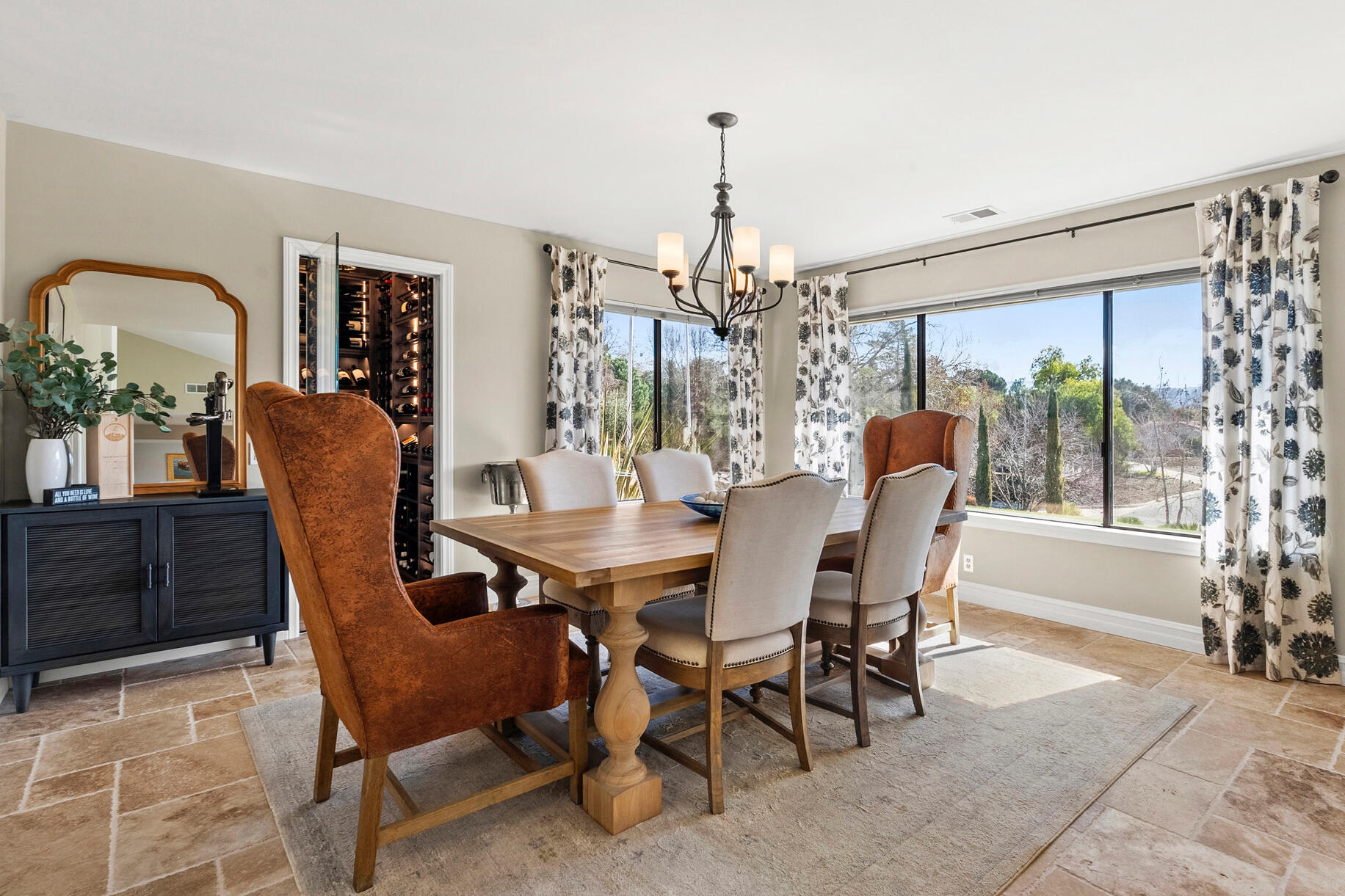 1855 Ringsted Drive Solvang, CA 93463 - Photo 7 of 30 a dining room with furniture a chandelier and wooden floor
