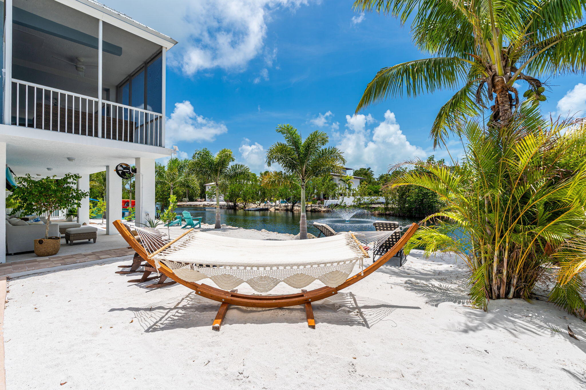 24 Mutiny Place Key Largo, FL 33037 - Photo 47 of 69 a view of a backyard with swimming pool and furniture