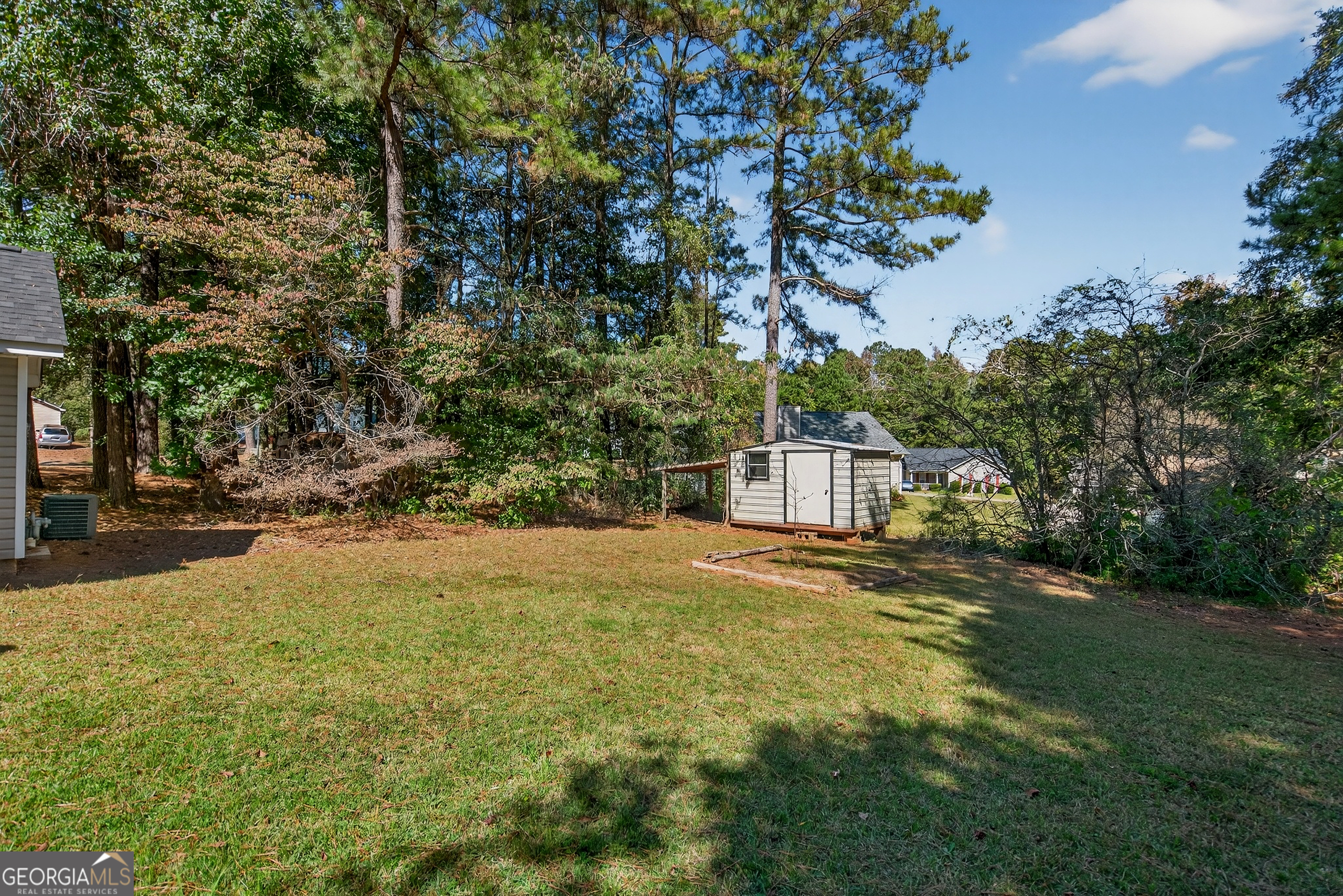 105 Ridgefield Drive LaGrange, GA 30241 - Photo 18 of 18 a view of a yard in front of a house with large trees