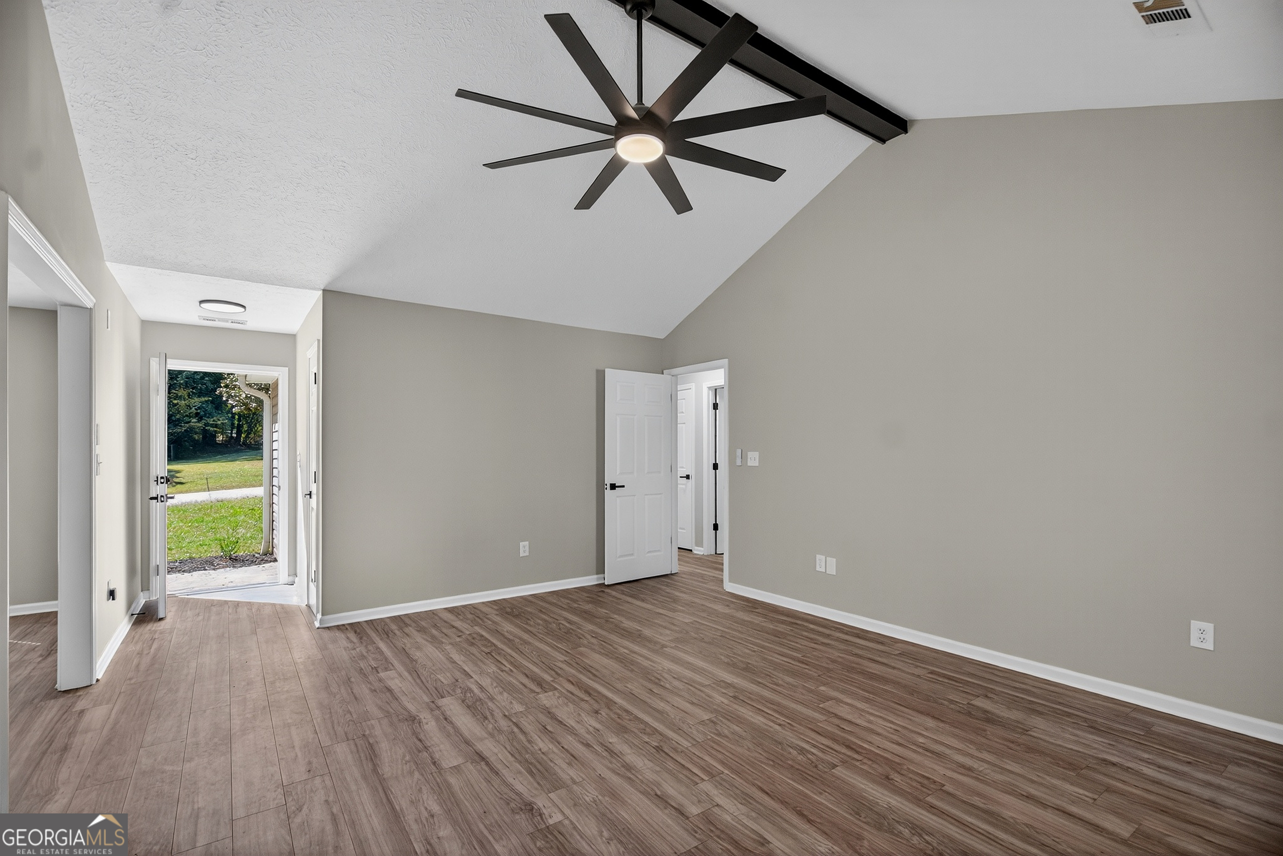 105 Ridgefield Drive LaGrange, GA 30241 - Photo 3 of 18 wooden floor in an empty room with a window