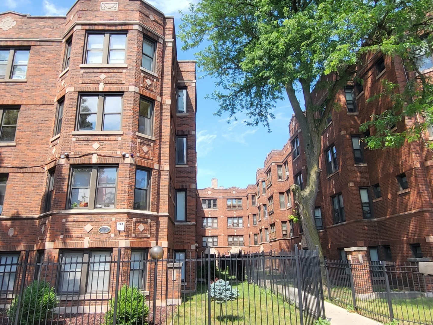 6820 South Perry Avenue Chicago, IL 60621 - Photo 1 of 7 front view of a building