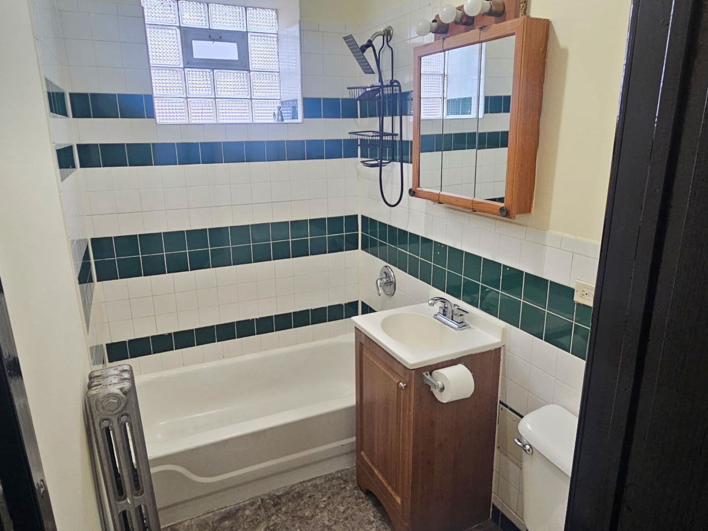 6820 South Perry Avenue Chicago, IL 60621 - Photo 7 of 7 a bathroom with a sink a toilet and shower