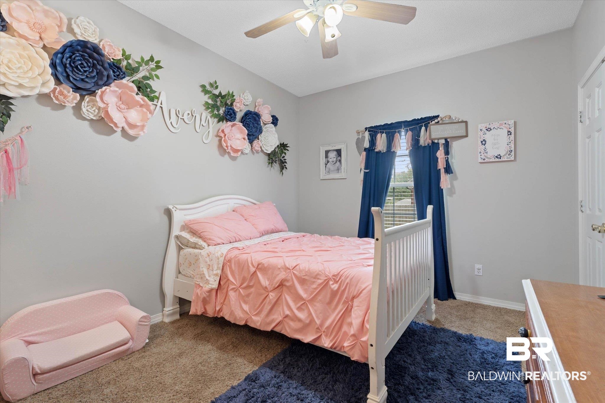 3170 Scott Dairy Loop Road West Mobile, AL 36695 - Photo 14 of 24 Bedroom featuring light gray walls, brown carpet flooring, and a window with blue curtains